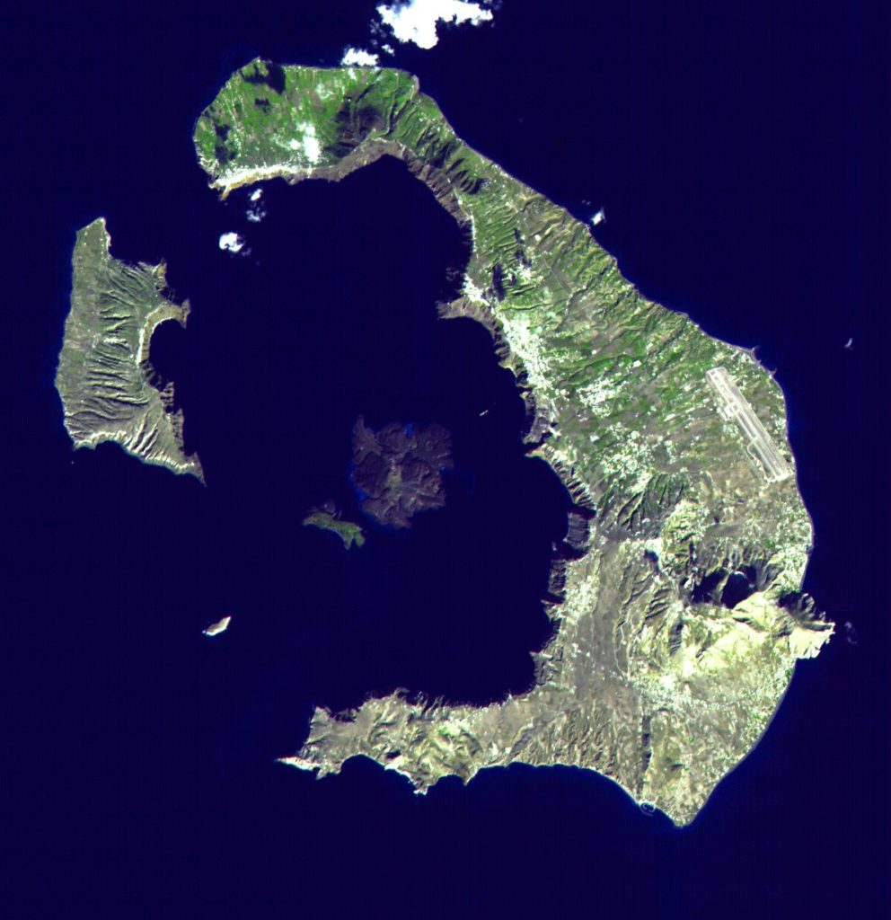 From above, the crater shape of the island is evident. The center island is the dormant volcano. 