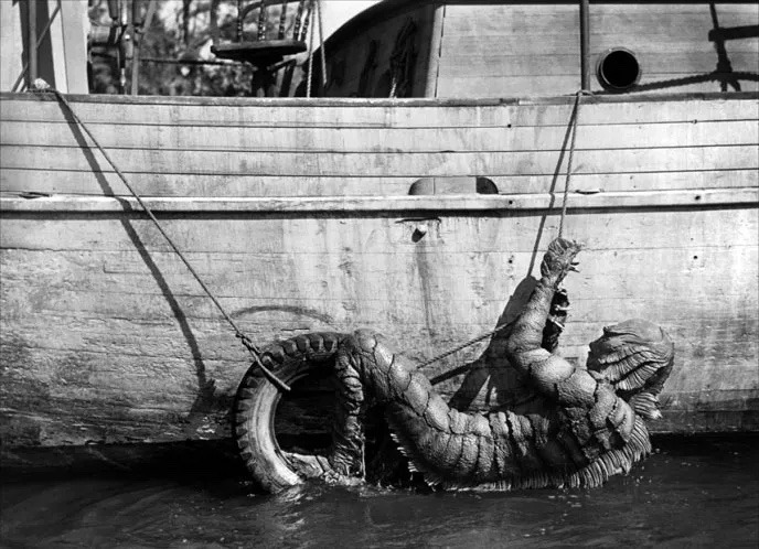 creature black lagoon side of boat