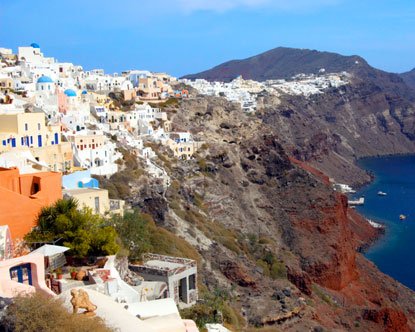 The city is built on a cliff, the edge of the crater formed by a volcanic explosion.